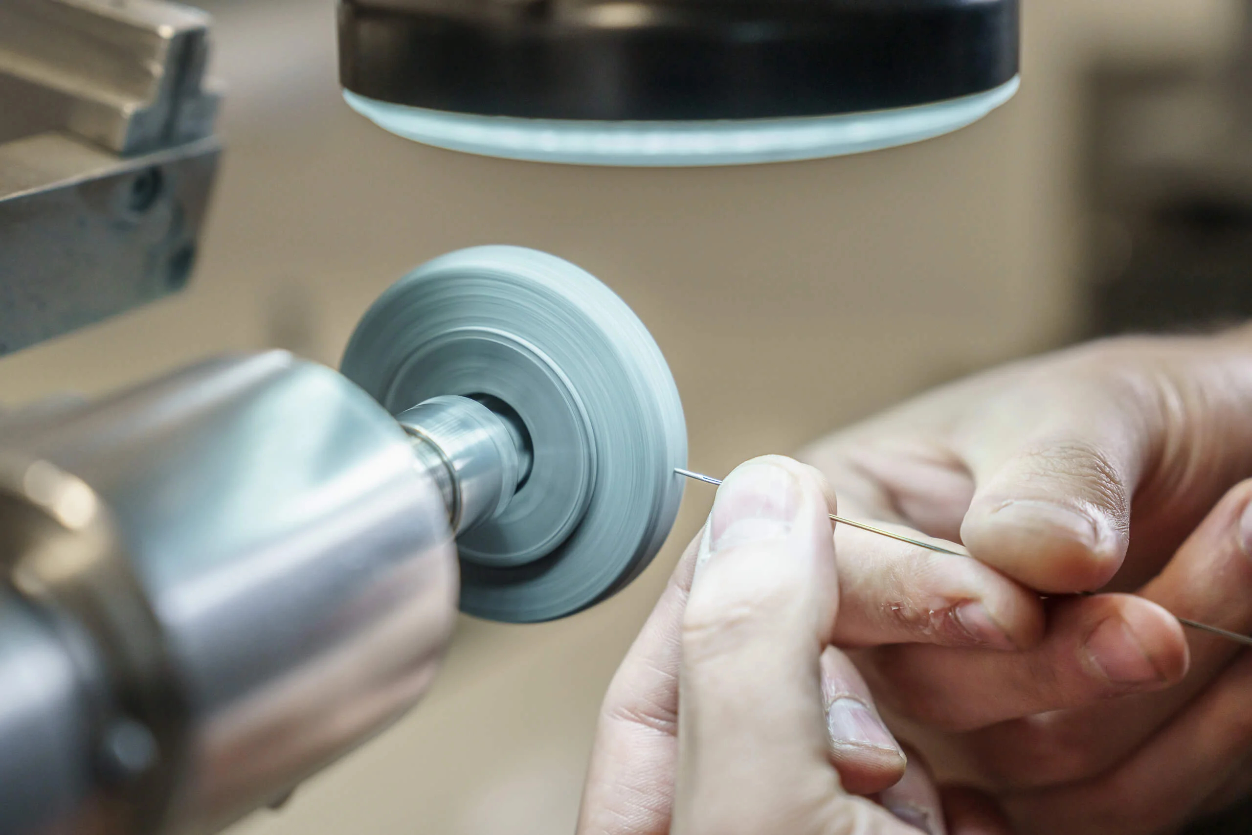 A Pro-Pas craftsman finishing a surgical instrument